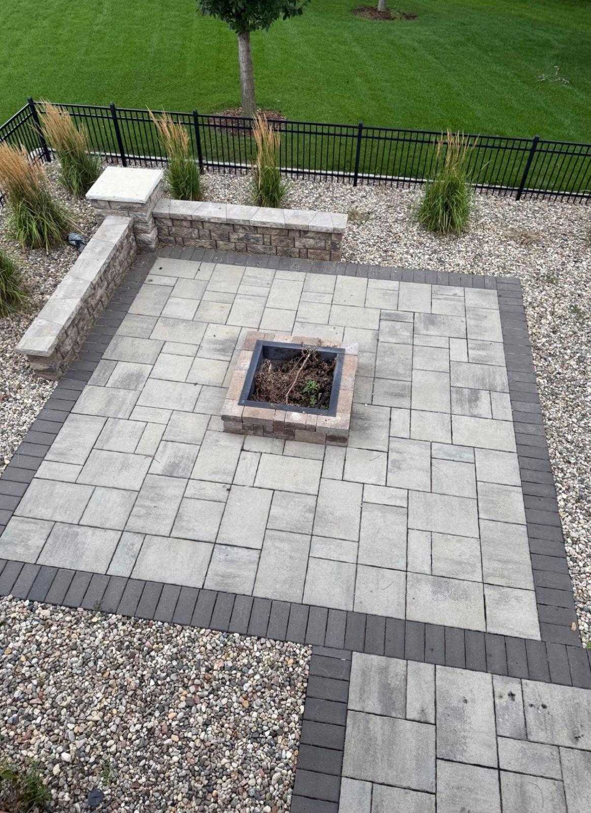 Precision stone paver patio and retaining wall hardscaping in North New Jersey